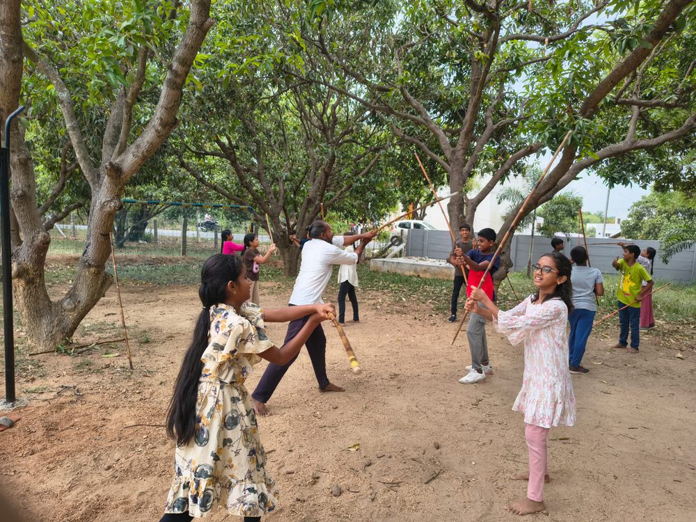 Children of all ages learning together at Mango Woods School